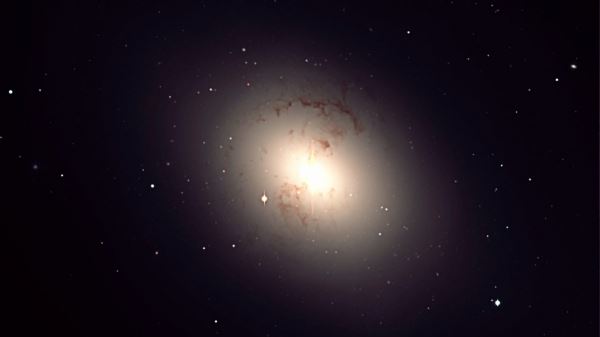 Что такое эллиптическая галактика?
